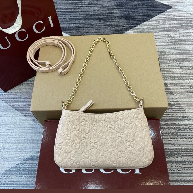 G*u*i top handle bags